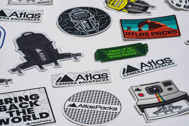 Atlas | Atlas Packs T-Shirts and Sticker Packs